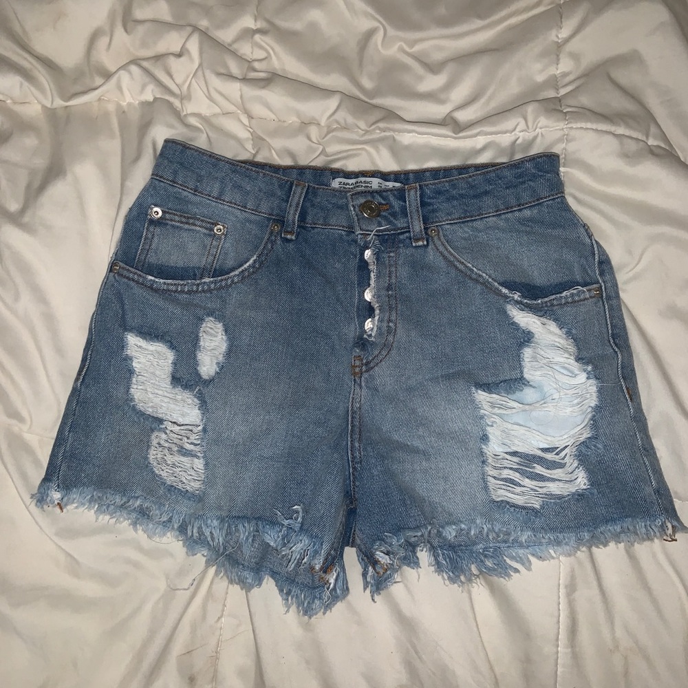 Distressed denim shorts